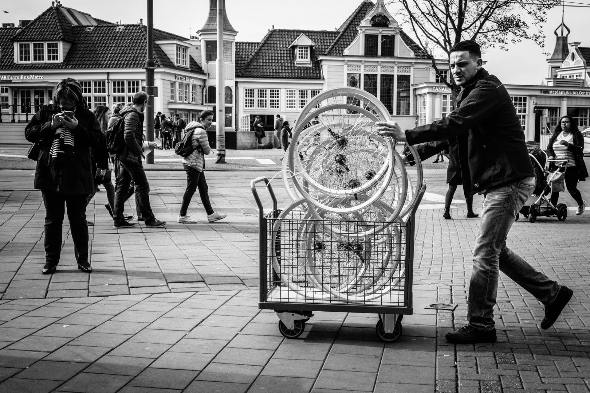Supplying the local bike shops with new bike wheels. Wheel man... Amsterdam, The Netherlands. Daily Observations By Guillaume Groen - As we street photographers roam the streets, observing and recording the fleeting moments that we encounter. Those Daily Observations go into photo books or as fine-prints on the wall as Street Photography grows as a profession and a medium.
